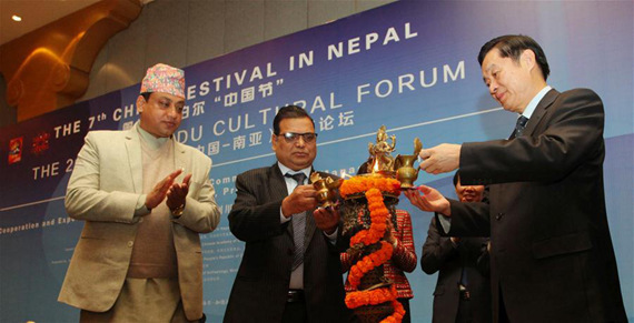Liu Qibao (R, front), the visiting member of the Political Bureau of the Communist Party of China (CPC) Central Committee and head of the CPC Central Committee's Publicity Department, and Nepalese Deputy Prime Minister Krishna Bahadur Mahara (C) jointly inaugurate the 7th China Festival in Nepal and the 2nd Kathmandu Cultural Forum in Kathmandu, Nepal, Dec. 19, 2016. (Photo: Xinhua/Sunil Sharma)