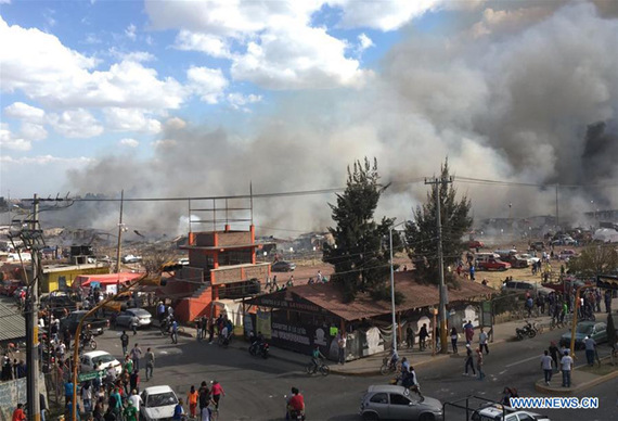 Photo taken by a mobile device on Dec. 20, 2016 shows the site of a blast at the San Pablito fireworks market in Tultepec, Mexico. (Photo: Xinhua/Str)