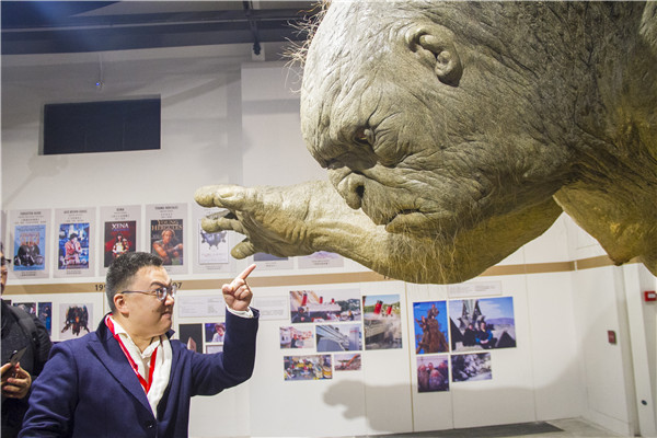 Visitors get a close look at the characters from fantasy films at the show The Future of the Visual Arts in Wuzhen, Zhejiang province. (Photo provided to China Daily)