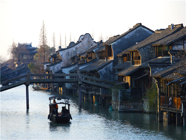 The ancient water town provides a unique backdrop for the futurist show. (Photo provided to China Daily)