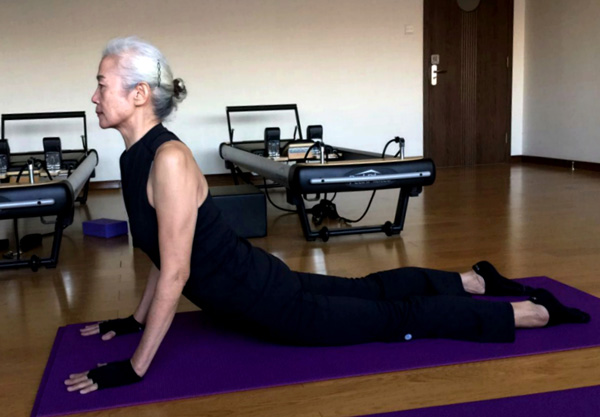 Bai Jinqin, 71, exercising at a gym in Tianjin. (Photo provided to China Daily)