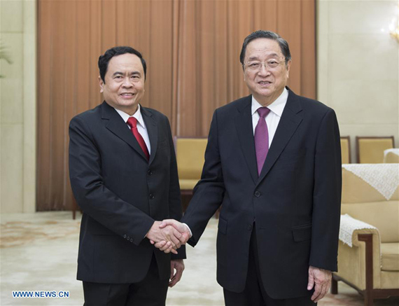 Yu Zhengsheng (R), chairman of the National Committee of the Chinese People's Political Consultative Conference (CPPCC), meets with Vice President and General Secretary of the Vietnam Fatherland Front (VFF) Central Committee Tran Thanh Man in Beijing, capital of China, Dec. 22, 2016. (Photo Xinhua/Xie Huanchi)