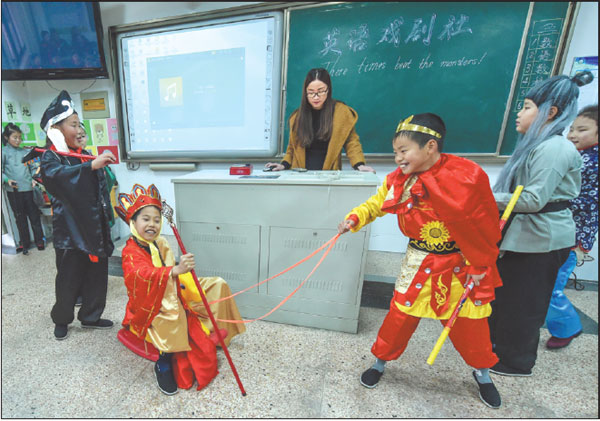 Students at the No 4 Primary School in Changxing county, Zhejiang province, perform during the school's English drama festival.Xu Yu / Xinhua