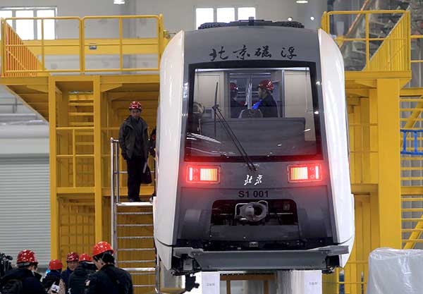 A maglev train for Beijing's new S1 line on Sunday. The maglev line is expected to start operation by the end of next year. Cheng Gong / For China Daily