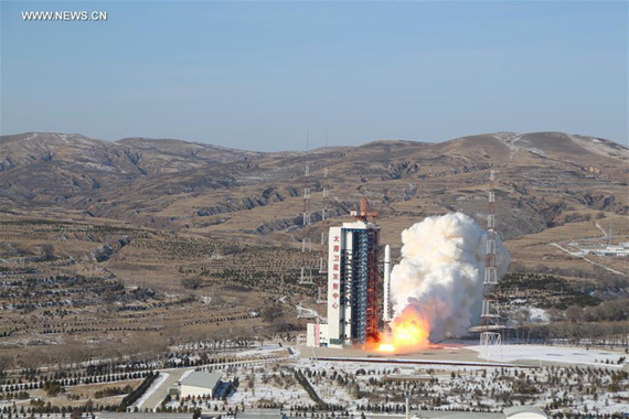 A Long March 2D rocket carrying a pair of 0.5-meter high-resolution remote sensing satellites, SuperView-1 01/02, blasts off from the launch pad at the Taiyuan Satellite Launch Center in north China's Shanxi Province, Dec. 28, 2016. The satellites are able to provide commercial images at 0.5-meter resolution. (Xinhua/Zheng Taotao)