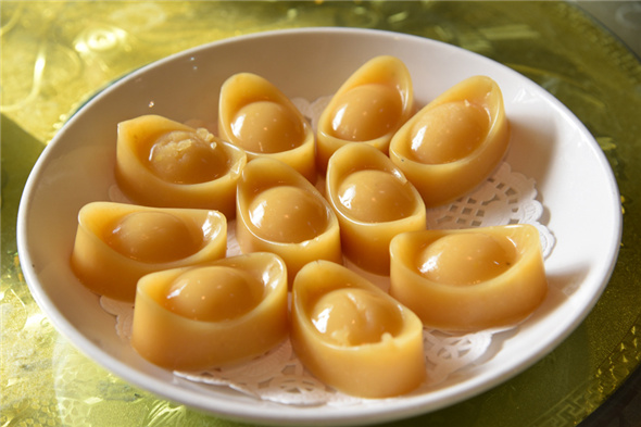 Wandou huang, made from sweet pea puree (Photo by Zhang Xingjian/chinadaily.com.cn)