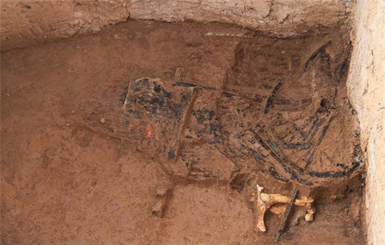 A wooden vehicle unearthed from from an ancient sacrificial site in Fengxiang, Shaanxi province. (Provided To China Daily)