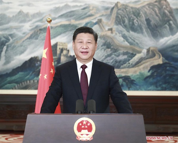 Chinese President Xi Jinping extends New Year greetings to all Chinese compatriots and people around the world in his New Year speech in Beijing, capital of China, Dec. 31, 2016. President Xi said 2016 was an extraordinary year for China as it achieved progress in every aspect, and urged the international community to join hands to build a more peaceful and prosperous world.(Xinhua/Lan Hongguang)