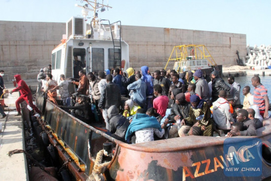 Illegal migrants arrive at the Zawiyah port, a naval base some 45 kilometers west of Libyan capital Tripoli, after they were rescued off the western city of Sabratha on May 24, 2016 as they were trying to reach Europe by boat. (Xinhua/Hamza Turkia) 