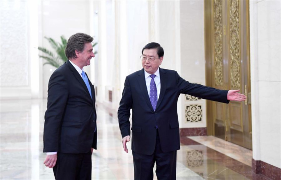 Zhang Dejiang (R), chairman of the Standing Committee of China's National People's Congress, holds talks with Gerardo Amarilla, president of Chamber of Representatives of Uruguay's National Congress, at the Great Hall of the People in Beijing, capital of China, Jan. 9, 2017. (Xinhua/Zhang Duo)