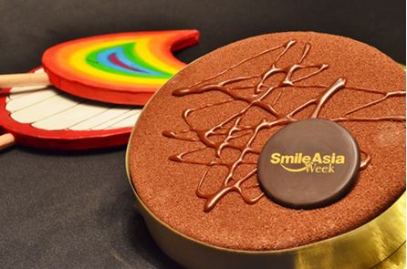The specially-designed cake for Smile Asia Week. (Photo provided to chinadaily.com.cn)