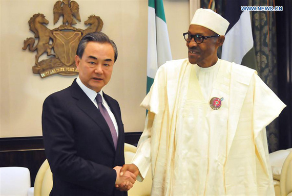 Nigerian President Muhammadu Buhari (R) meets with Chinese Foreign Minister Wang Yi in Abuja, Nigeria, on Jan. 11, 2017. The Nigerian government reaffirmed its commitment to One-China policy on Wednesday, saying Nigeria will stay committed to the long-standing friendship and cooperation with China. (Xinhua/Zhang Baoping)