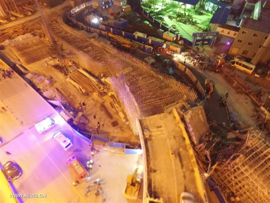 Picture shows the collapse site of the viaduct in Zhengzhou, capital city of Henan province, on Jan. 12, 2016. One was killed and eight others were injured after part of an old viaduct in central China's Zhengzhou city collapsed Thursday evening, hitting a bus. (Xinhua/Feng Dapeng)