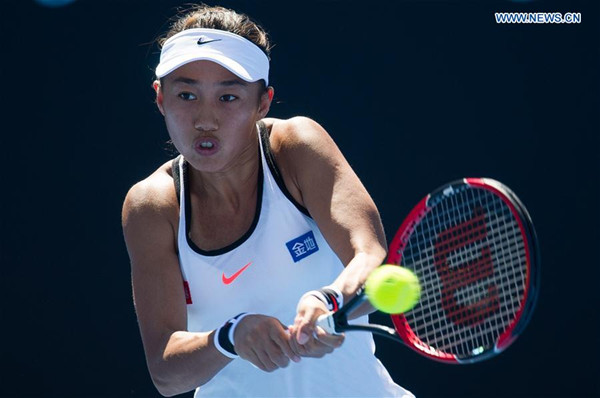 Zhang Shuai of China hits the ball during the women's singles first-round match against Aliaksandra Sasnovich of Belarus at the Australian Open Tennis Championships in Melbourne, Australia, Jan. 16, 2017. Zhang won 2-0. (Xinhua/Bai Xue) 