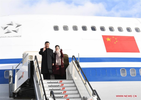 Chinese President Xi Jinping and his wife Peng Liyuan walk out of the plane after arrival in Zurich, Switzerland, Jan. 15, 2017. (Xinhua/Rao Aimin)