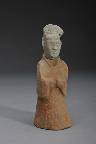 A statue unearthed at the Neolithic Shijiahe Culture site in Hubei Province and a pottery statuette excavated from the Xizhucun Tomb in Henan Province (Photo/Courtesy of the CASS Institute of Archeology)