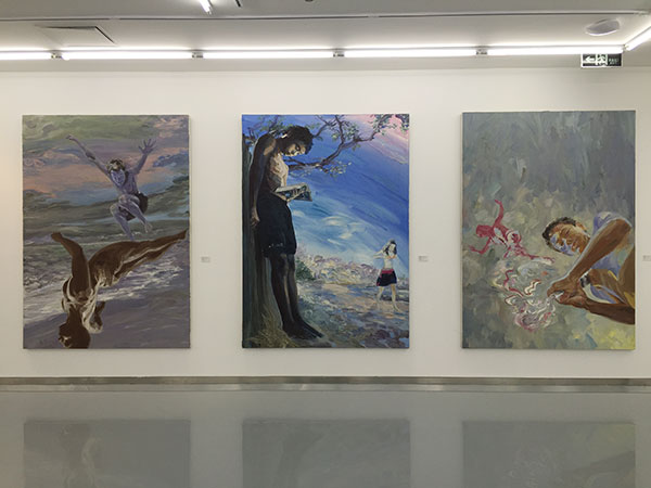 Some of Li Xinjian's oil paintings featuring his son in the exhibition Beauty without Beards at The KWM Art Centre. (Photo by Li Jing/China Daily)