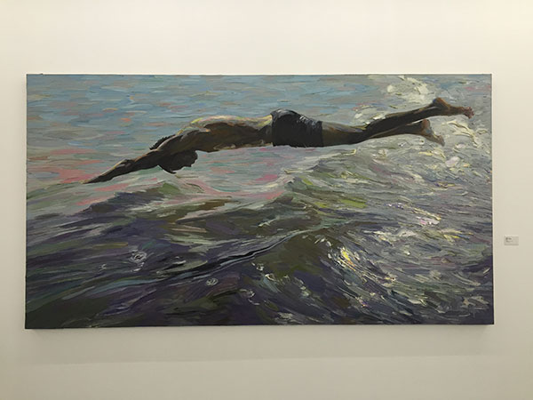 Li Xinjian's oil painting featuring his son in the exhibition Beauty without Beards at The KWM Art Centre. (Photo by Li Jing/China Daily)