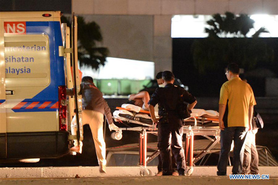 A man who has been rescued after a boat sank off Malaysia's Sabah state is transferred to a hospital for treatment in Kota Kinabalu, Malaysia, on Jan. 30, 2017. (Photo/Xinhua)