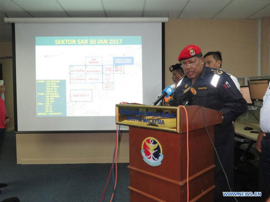 Ahmad Puzi Ab Kahar (Front), director general of Malaysian Maritime Enforcement Agency, briefs media on the rescue mission of the boat accident in Kota Kinabalu, Malaysia, on Jan 30, 2017.(Photo/Xinhua)