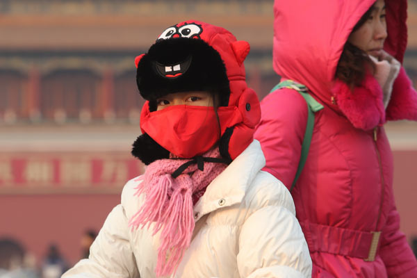 A girl wears a mask in Beijing. (Photo provided to China Daily)