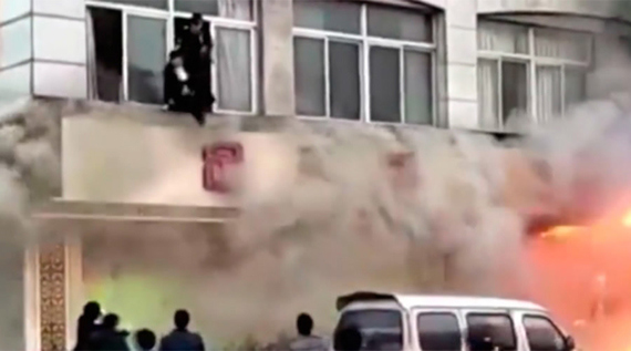 A fire breaks out at a foot spa on Sunday afternoon in Tiantai County, Zhejiang Province. (Photo/CGTN) 