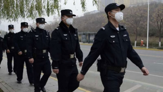 A new squad of environmental police patrol a street in Beijing to sniff out the sources of pollutants. (Photo/CGTN)