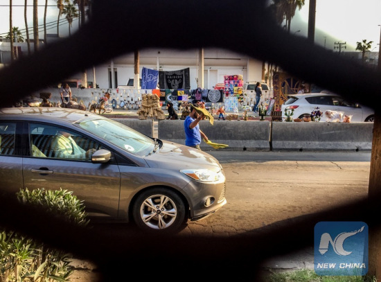 Image taken on Feb. 3, 2017, shows a view of a section of the already existed border wall and fences between the United States and Mexico in California border city Calexico. U.S. President Donald Trump signed an executive order to build a large physical barrier between the U.S. and Mexico on Jan. 25, 2017. (Xinhua/Zhang Chaoqun)