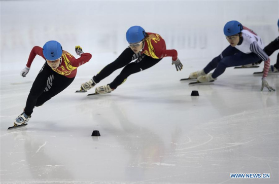 Zang Yize (L) and Xu Aili (C) of China compete during Ladies' 500M Final of Short Track Speed Skating at the 28th Winter Universiade in Almaty, Kazakhstan, Feb. 6, 2017. Zang Yize and Xu Aili took the gold and sivler with 44.015 seconds and 44.124 seconds respectively.(Xinhua/Fei Maohua)