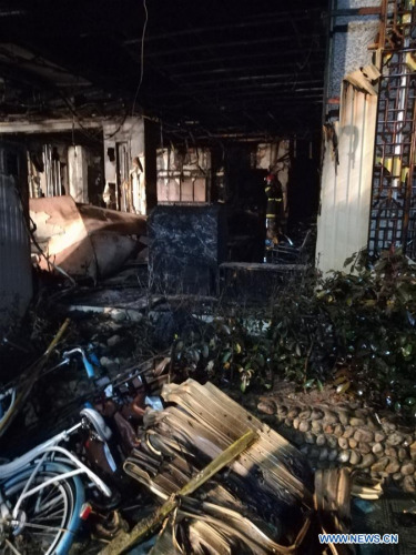 Photo taken on Feb. 6, 2017 shows the accident site after a fire broke out in the Zuxintang Foot Massage Parlor in Tiantai County, east China's Zhejiang Province. At least 18 people have been killed and another two injured after the foot massage parlor caught fire on Sunday afternoon. (Xinhua/Wang Junlu)