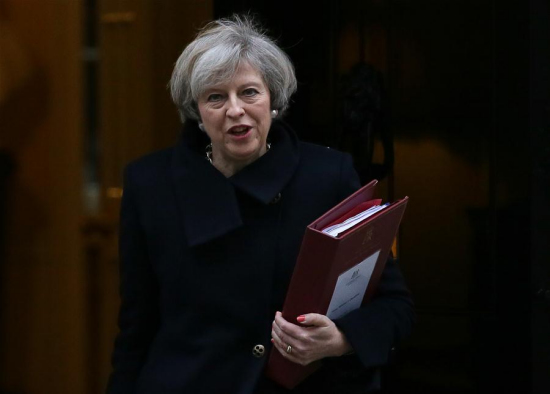 British Prime Minister Theresa May leaves 10 Downing Street for Prime Minister's questions at the House of parliament in London, Britain, Feb. 8, 2017.  (Xinhua/Tim Ireland)