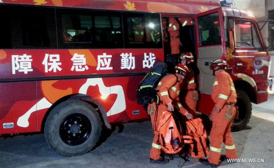 Fire fighters gather for a quake rescue mission in Zhaotong, southwest China's Yunnan Province, Feb. 8, 2017. (Xinhua)
