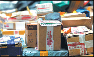 Parcels await collection at a warehouse in Nanjing, Jiangsu pro-vince. (Photo provided to China Daily)
