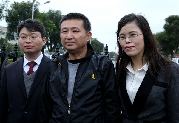 Chen Man stands with his lawyer, Wang Wanqiong, following the quashing of his conviction for murder in February last year. (PROVIDED TO CHINA DAILY)