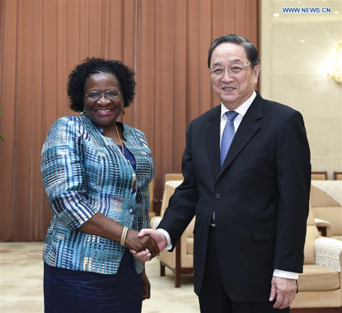 Yu Zhengsheng (R), chairman of the National Committee of the Chinese People's Political Consultative Conference, meets with Speaker of the Mozambique Parliament Veronica Macamo in Beijing, capital of China, Feb. 14, 2017. (Xinhua/Zhang Ling)