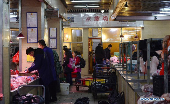 Photo taken on Feb. 22, 2017 shows a closed booth engaging in live poultry trading at a market in Nanchang, capital of east China's Jiangxi Province. 