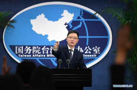 An Fengshan, spokesperson for the State Council Taiwan Affairs Office, gestures at a regular press conference in Beijing, capital of China, Feb. 22, 2017. (Xinhua/Chen Yehua)