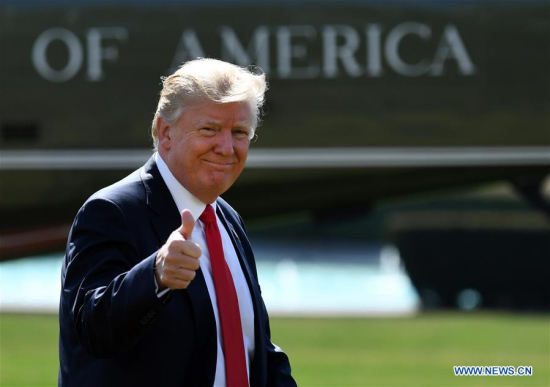 U.S. President Donald Trump walks to the Oval Office after returning to the White House in Washington D.C., the United States, on Feb 24, 2017. (Xinhua/Yin Bogu)