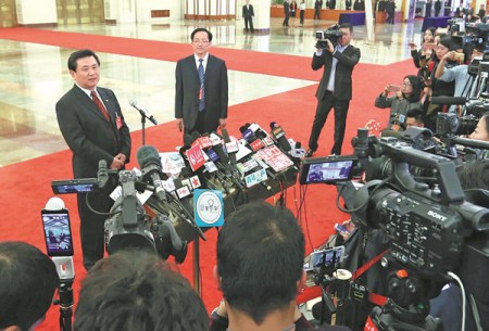 Feng Zhenglin, head of the Civil Aviation Administration of China, tells reporters in Beijing on Friday that there is still space to improve the rate of commercial flight punctuality. (Photo/CHINA DAILY)
