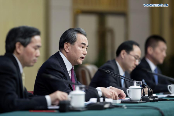 Chinese Foreign Minister Wang Yi (2nd L) takes questions on China's foreign policy and foreign relations at a press conference for the fifth session of the 12th National People's Congress in Beijing, capital of China, March 8, 2017. (Xinhua/Cui Xinyu)