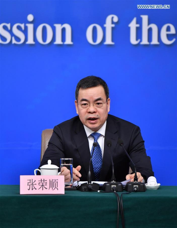 Zhang Rongshun, vice-chairman of the Legislative Affairs Commission of the National People's Congress (NPC) Standing Committee, takes questions on the draft general provisions of civil law and legislation of the NPC at a press conference for the fifth session of the 12th NPC in Beijing, capital of China, March 9, 2017. (Xinhua/Li Xin) 