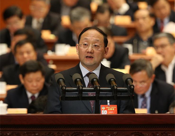 On behalf of the Taiwan Democratic Self-government League Central Committee and the All-China Federation of Taiwan Compatriots, Jiang Liping, a member of the 12th National Committee of the Chinese People's Political Consultative Conference (CPPCC), delivers a speech at the fourth plenary meeting of the fifth session of the 12th CPPCC National Committee in the Great Hall of the People in Beijing, capital of China, March 11, 2017. (Xinhua/Yao Dawei)
