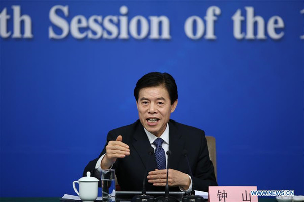 Chinese Minister of Commerce Zhong Shan answers questions at a press conference on structural adjustments and innovation for the fifth session of the 12th National People's Congress in Beijing, capital of China, March 11, 2017. (Xinhua/Jin Liwang)