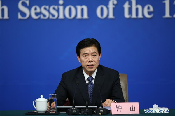 Chinese Minister of Commerce Zhong Shan answers questions at a press conference on structural adjustments and innovation for the fifth session of the 12th National People's Congress in Beijing, capital of China, March 11, 2017. (Xinhua/Jin Liwang)