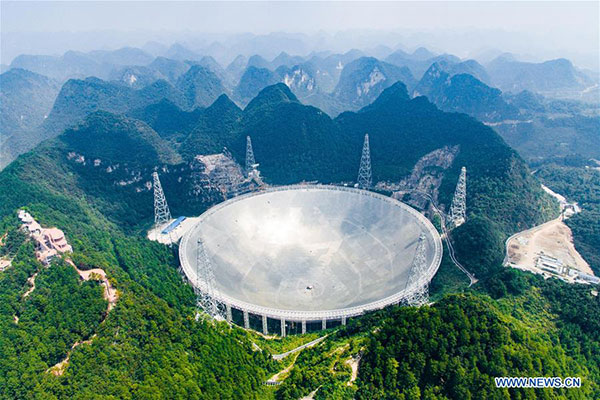 Photo taken on Sept 24, 2016 shows the 500-meter Aperture Spherical Telescope (FAST) in Pingtang county, Southwest China's Guizhou province. (Photo/Xinhua)