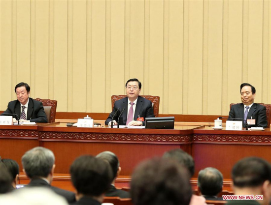 Zhang Dejiang, executive chairperson of the presidium for the fifth session of China's 12th National People's Congress (NPC) and chairman of the Standing Committee of the NPC, presides over the fourth meeting of the presidium for the fifth session of the 12th NPC at the Great Hall of the People in Beijing, capital of China, March 14, 2017. (Xinhua/Ma Zhancheng)