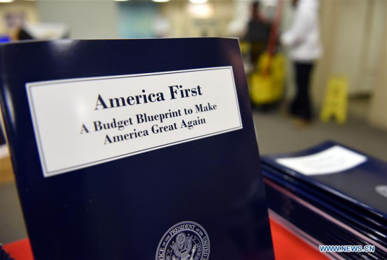 Copies of U.S. President Donald Trump administration's first budget blueprint are seen in Washington D.C., the United States, on March 16, 2017. U.S. (Xinhua/Yin Bogu) 
