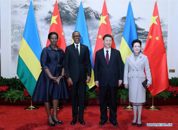 Chinese President Xi Jinping (2nd R) and his wife Peng Liyuan (1st R) pose for a photo with Rwanda President Paul Kagame (2nd L) and his wife in Beijing, capital of China, March 17, 2017. Xi held a welcome ceremony for Kagame's China visit before their talks on Friday. (Xinhua/Ju Peng)