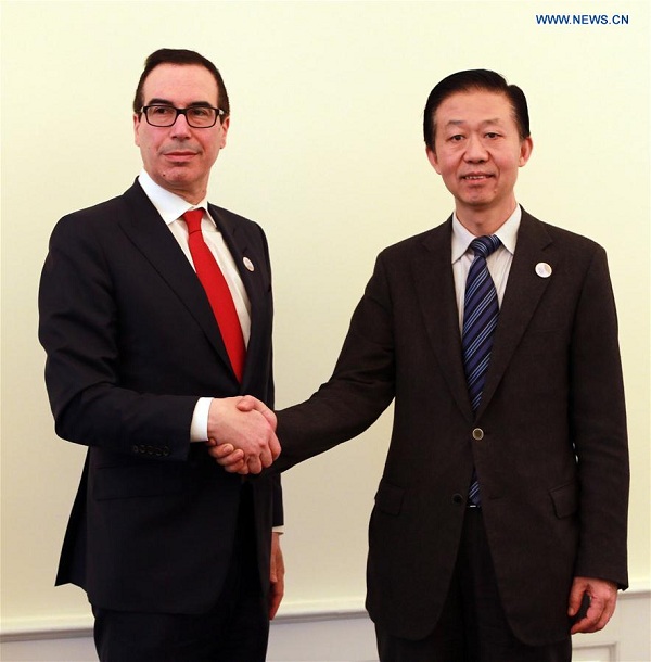 Chinese Finance Minister Xiao Jie (R) meets with U.S. Treasury Secretary Steven Mnuchin in Baden-Baden, Germany, March 18, 2017. Chinese Finance Minister Xiao Jie on Saturday met with U.S. Treasury Secretary Steven Mnuchin on the sidelines of the G20 Finance Ministers and Central Bank Governors Meeting in Germany's southwestern city of Baden-Baden. The two sides have called for enhancing the economic cooperation between the two countries. (Xinhua/Luo Huanhuan)