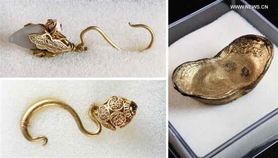 Como photo taken on March 19, 2017 shows golden ingot and jewelleries unearthed during an archaeological excavation at Pengshan District in Meishan City, southwest China's Sichuan Province. More than 10,000 gold and silver items that sank to the bottom of a river in Sichuan Province over 300 years ago have been recovered, archeologists said Monday. (Xinhua/Li He)